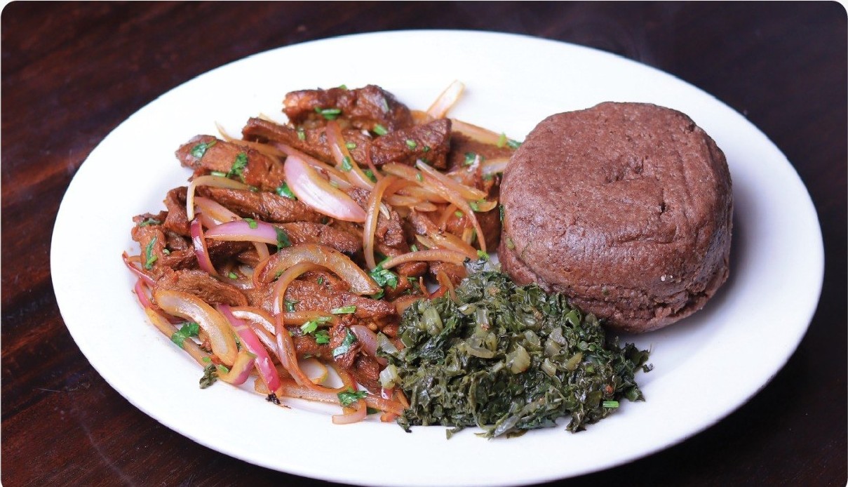 Beef Strips with Brown Ugali at Olive & Grill